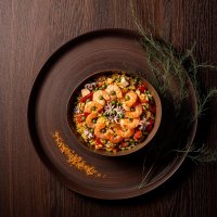 Paella with rosemary decoration